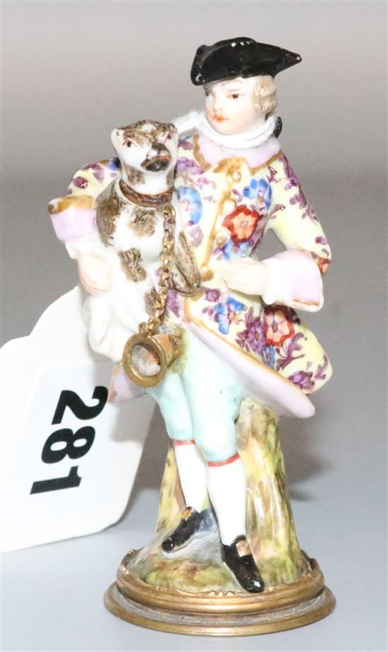 A porcelain figural scent bottle